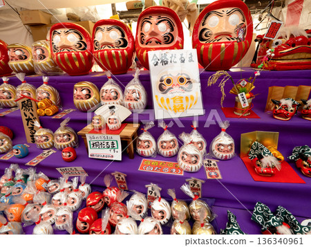 Colorful daruma dolls lined up at a street stall in Tokyo Colorful daruma dolls lined up at a street stall in Tokyo 136340961