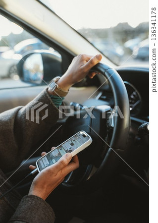 Distracted Driving with Smartphone in Hand Distracted Driving with Smartphone in Hand 136341178