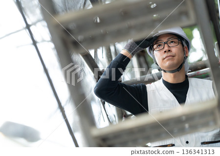 Men in work clothes, knickerbockers, helmet Men in work clothes, knickerbockers, helmet 136341313
