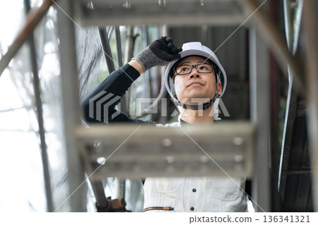 Men in work clothes, knickerbockers, helmet Men in work clothes, knickerbockers, helmet 136341321