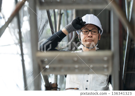Men in work clothes, knickerbockers, helmet Men in work clothes, knickerbockers, helmet 136341323