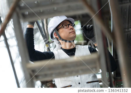 Men in work clothes, knickerbockers, helmet Men in work clothes, knickerbockers, helmet 136341332