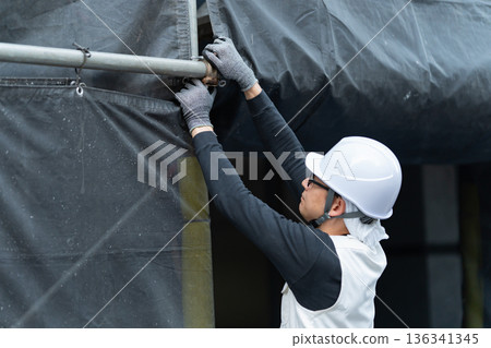 Men in work clothes, knickerbockers, helmet Men in work clothes, knickerbockers, helmet 136341345