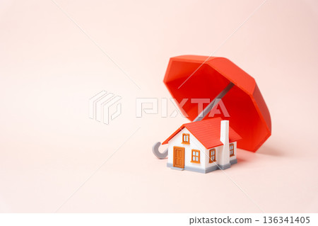 A residential building under a red umbrella. Property insurance. Home protection planning covers damage and disasters. Financial security shields owners and long term investment. A residential building under a red umbrella. Property insurance. Home protection planning covers damage and disasters. Financial security shields owners and long term investment. 136341405