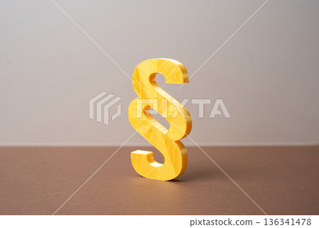 The Golden Paragraph. The Symbol of Law and Articles of Regulation. Legislation and Lawmaking. Justice theme reflecting authority, legal framework, and structured governance in society 136341478