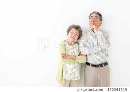 Worried senior couple Worried senior couple 136341519