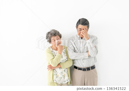 Worried senior couple Worried senior couple 136341522