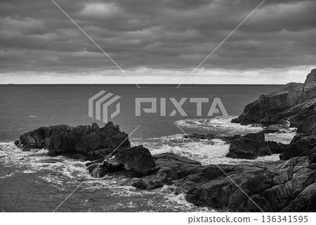 Dramatic black and white rocky coastline 136341595