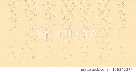 Sparkling champagne bubbles rising in golden drink 136342374