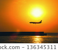 Sunset and airplane 136345311