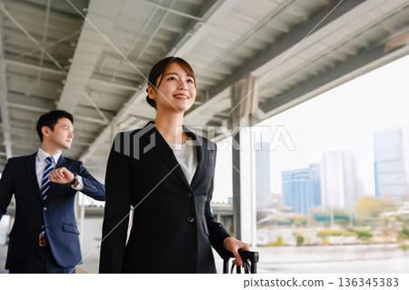 Businesswoman moving around the station 136345383