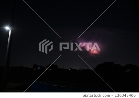 Lightning shining in the darkness, night, thunderclouds Lightning shining in the darkness, night, thunderclouds 136345406