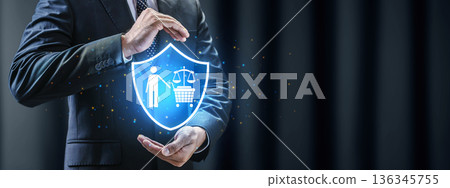 A businessman in a dark suit holds a glowing blue shield symbol featuring a shopper and justice scales, representing consumer protection and retail law A businessman in a dark suit holds a glowing blue shield symbol featuring a shopper and justice scales, representing consumer protection and retail law 136345755