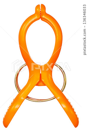 Orange clothespin (laundry clip) cut out on a white background Orange clothespin (laundry clip) cut out on a white background 136346033