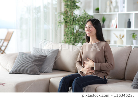 Happy asian woman having a healthy intestinal tract Happy asian woman having a healthy intestinal tract 136346253