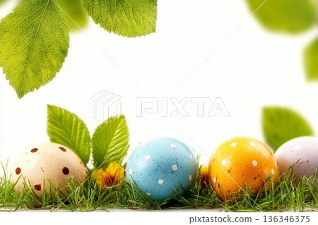 A collection of painted easter eggs under bright green tree leaves celebrating a Happy Easter in spring with green short meadow grass against an isolated white background. 136346375