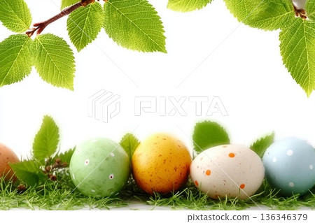 A collection of painted easter eggs under bright green tree leaves celebrating a Happy Easter in spring with green short meadow grass against an isolated white background. A collection of painted easter eggs under bright green tree leaves celebrating a Happy Easter in spring with green short meadow grass against an isolated white background. 136346379