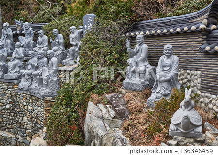 Buddhist statues in Haedong Yonggungsa Buddhist temple in Gijang-gun in Busan, South Korea 136346439
