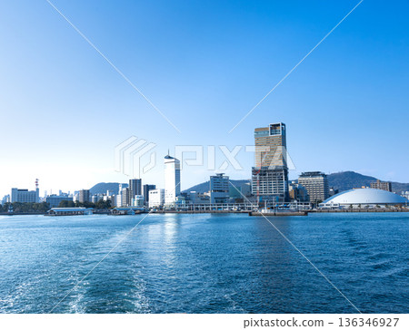 Urban scenery with skyscrapers at Takamatsu Port seen from the ferry bound for Ogijima Urban scenery with skyscrapers at Takamatsu Port seen from the ferry bound for Ogijima 136346927
