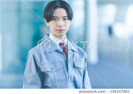 Man in work clothes, serious face 136347901