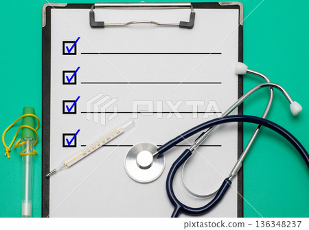 Stethoscope, thermometer and checklist Stethoscope, thermometer and checklist 136348237