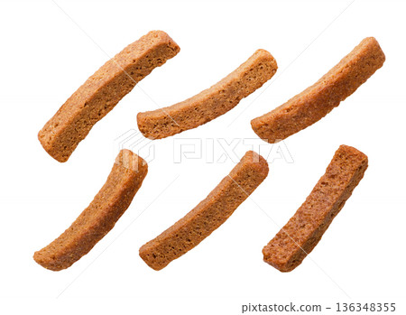 Set of rye croutons on a white background. Top view Set of rye croutons on a white background. Top view 136348355