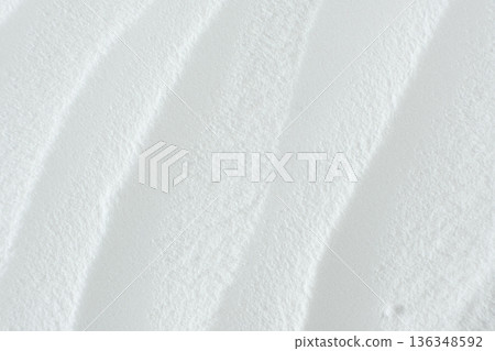 Soda powder sodium bicarbonate surface. Abstract white background. White texture with wavy patterns top view 136348592
