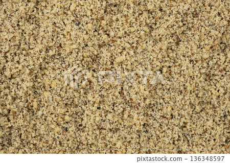 Macro crushed walnut kernels top view 136348597