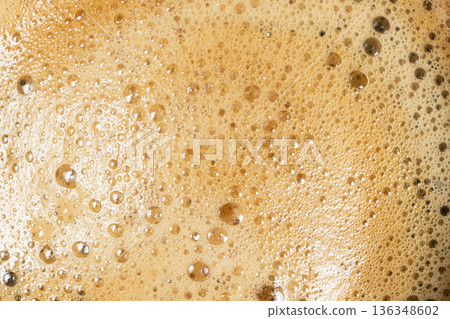Brown and gold coffee bubbles texture for culinary background. Brown and gold coffee bubbles texture for culinary background. 136348602
