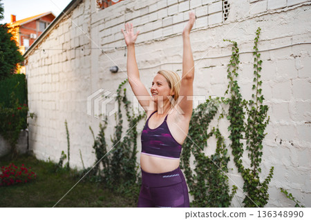 Mother embraces fitness journey outdoors after childbirth to feel revitalized Mother embraces fitness journey outdoors after childbirth to feel revitalized 136348990