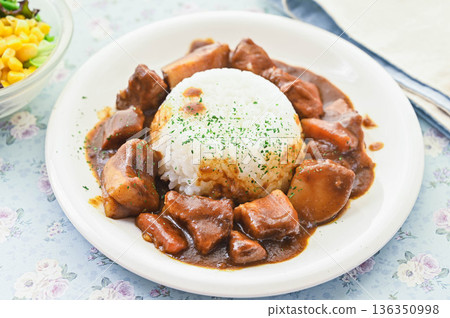 Pork curry made with diced meat 136350998