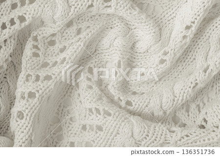 White knitted lace fabric with openwork pattern and soft folds, textile texture. Natural background showing knit texture, dancer cloud color, textile surface, copy space, mockup for fashion design White knitted lace fabric with openwork pattern and soft folds, textile texture. Natural background showing knit texture, dancer cloud color, textile surface, copy space, mockup for fashion design 136351736