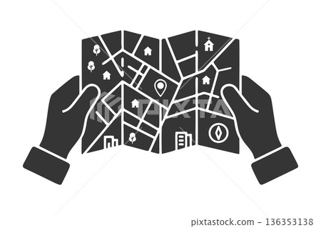 Silhouette icon of a hand holding a map 136353138