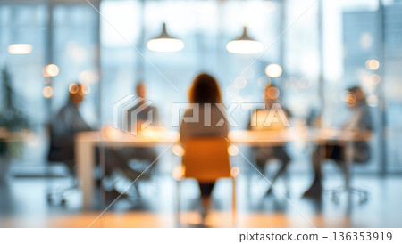 blurred Corporate people working together in the conference room of their office, sharing idea and planning the business strategy of their company . blurred Corporate people working together in the conference room of their office, sharing idea and planning the business strategy of their company . 136353919