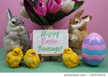 Happy Easter Blessings! text with easter elements decoration on pink and green background Happy Easter Blessings! text with easter elements decoration on pink and green background 136354420