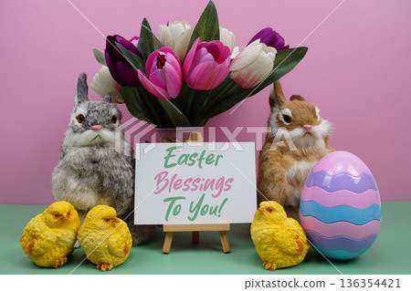 Easter Blessings To You! text with easter elements decoration on pink and green background Easter Blessings To You! text with easter elements decoration on pink and green background 136354421