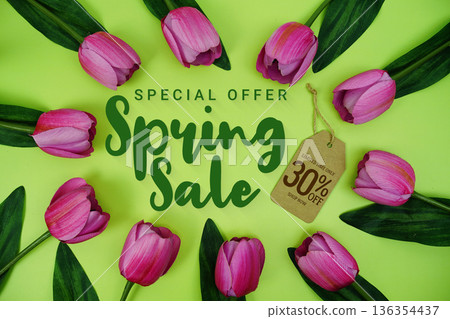 Hello Spring Sale and Price tag 30% off with tulip flowers on green background Hello Spring Sale and Price tag 30% off with tulip flowers on green background 136354437
