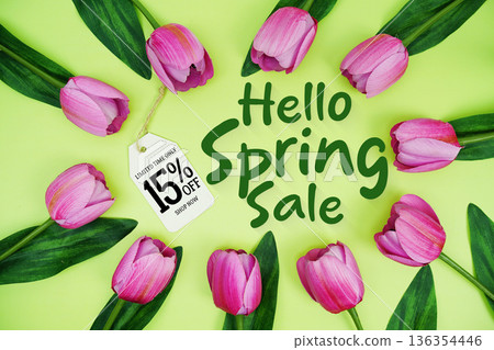 Hello Spring Sale and Price tag 15% off  with tulip flowers on green background 136354446