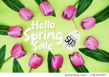 Hello Spring Sale and Price tag 50% off  with tulip flowers on green background 136354447