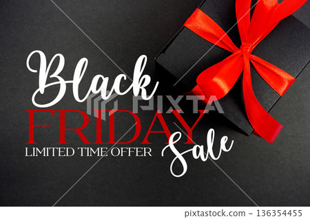 Black Friday Sale text with gift box present on black background 136354455