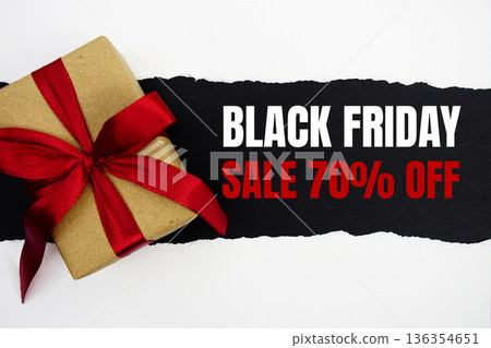 Black Friday Sale text with gift box present on black background Black Friday Sale text with gift box present on black background 136354651