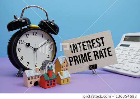 Interest Prime Rate phrase with Calculator, alarm clock, Model Houses Real Estate Financial Concept Interest Prime Rate phrase with Calculator, alarm clock, Model Houses Real Estate Financial Concept 136354688