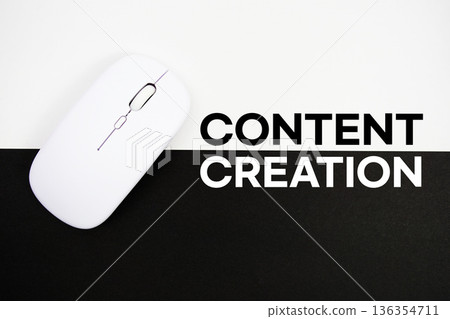 Content Creation text and wireless mouse on white and black background Content Creation text and wireless mouse on white and black background 136354711