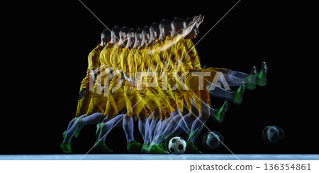 Stroboscopic soccer kick motion sequence in dark studio. Stroboscopic soccer kick motion sequence in dark studio. 136354861