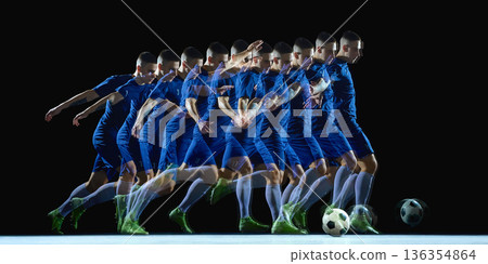 Stroboscopic motion of soccer player kicking ball in dark studio. Stroboscopic motion of soccer player kicking ball in dark studio. 136354864