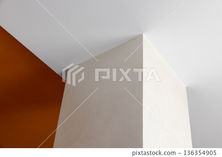 A stark white pillar rises at a sharp angle 136354905