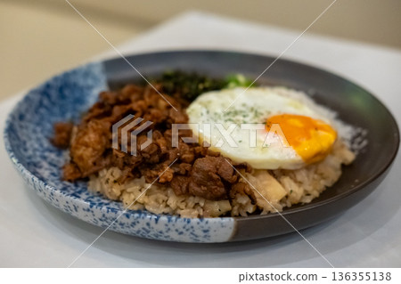 Beef fat fried rice with stir fry sliced meat and fried egg Beef fat fried rice with stir fry sliced meat and fried egg 136355138