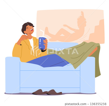 Relaxed young man sitting on sofa, drinking soda and laughing at comedy film enjoying leisure time Relaxed young man sitting on sofa, drinking soda and laughing at comedy film enjoying leisure time 136355238