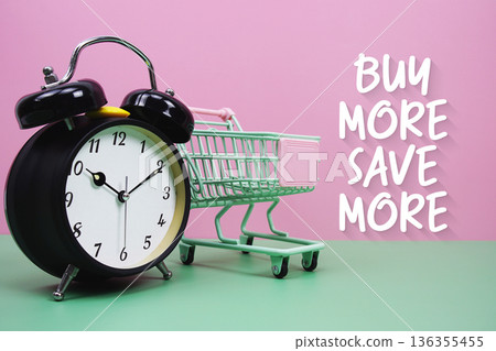 Buy More Save More text with trolley shopping cart 136355455