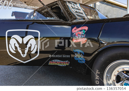 Custom made sports car parked showing the drivers side on motor show event 136357054